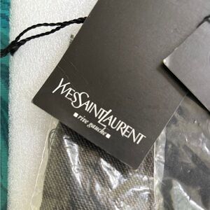 Authentic Yves Saint Laurent Black Designer closure(buttons in French)